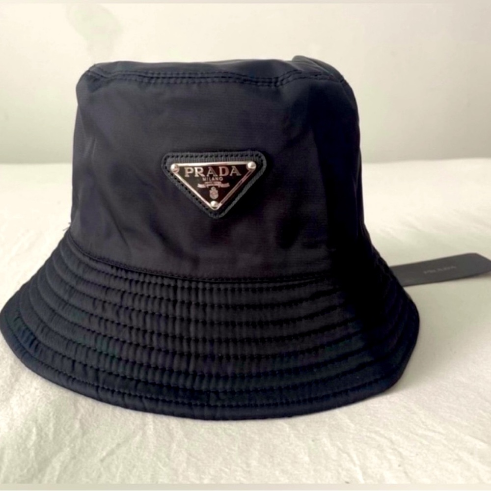 Cute black Prada bucket hat! Only worn once - it’s just not my vibe.